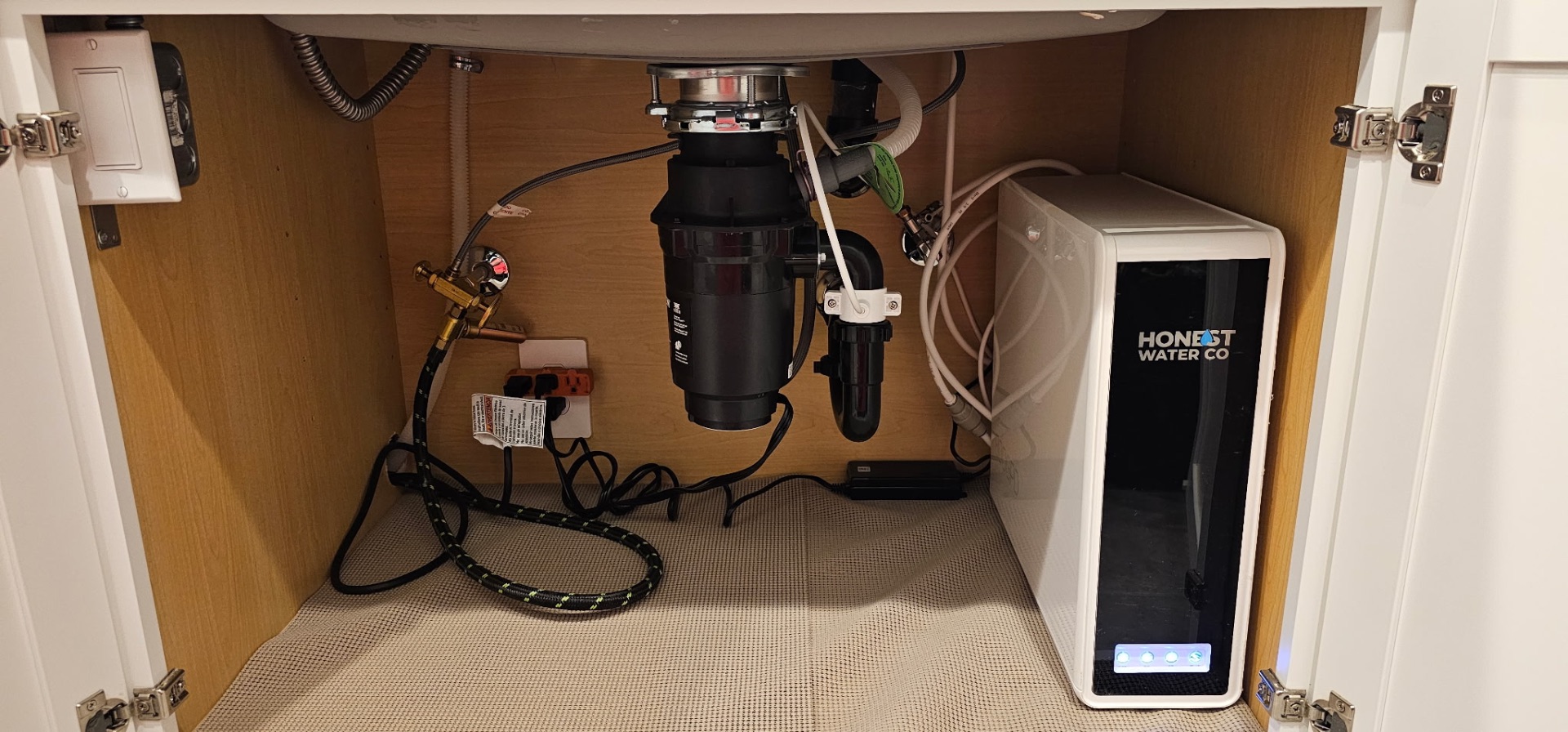 Honest Water Co tankless reverse osmosis system installed under a kitchen sink